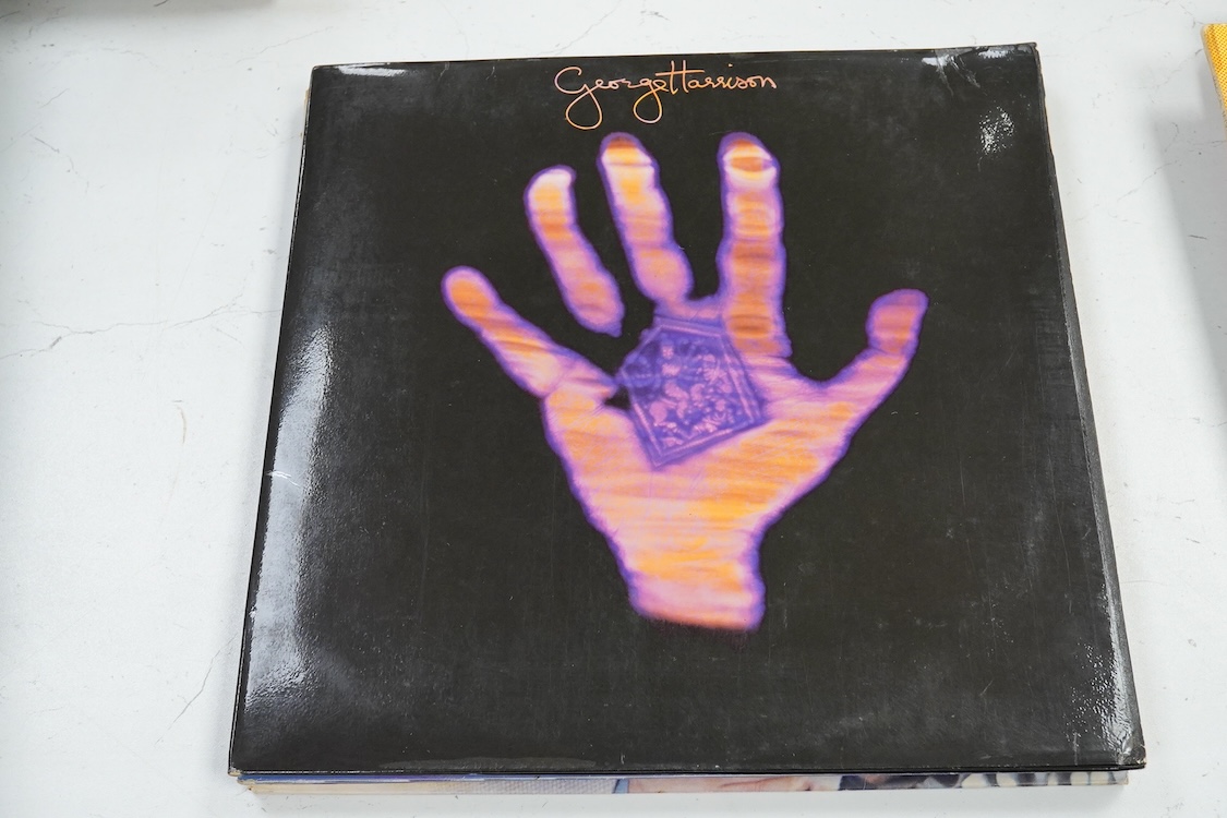 Fourteen LP record albums including eleven The Beatles and related; Sgt. Pepper’s Lonely Hearts Club Band (plus an additional three others), The Beatles at the Hollywood Bowl, Magical Mystery Tour, Revolver, etc., plus t